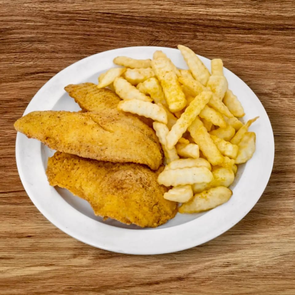 Two pieces of golden-brown fried fish and a pile of crinkle-cut fries on a white plate.
